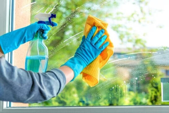 Residential Window Washing Services Professional window cleaning service using streak-free glass cleaner and microfiber cloth
